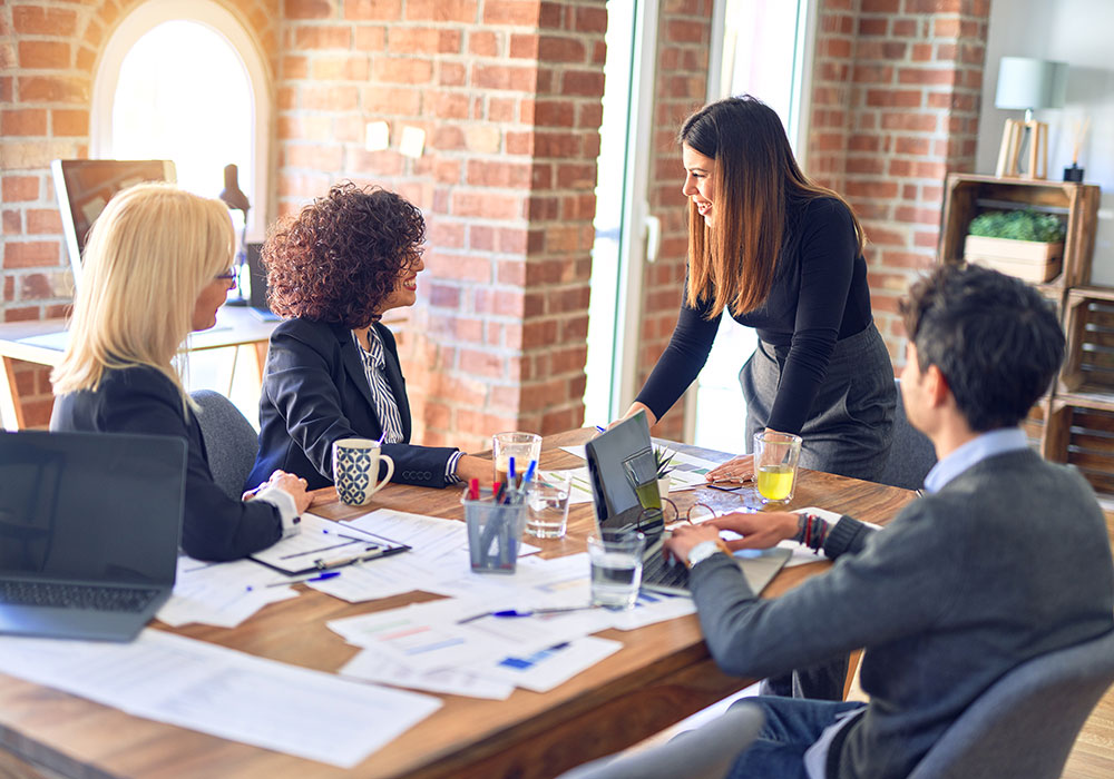 Group Business Workers Smiling Happy Confident Working Together With Smile Face Young Beautiful Woman Standing Explaining Documents Office